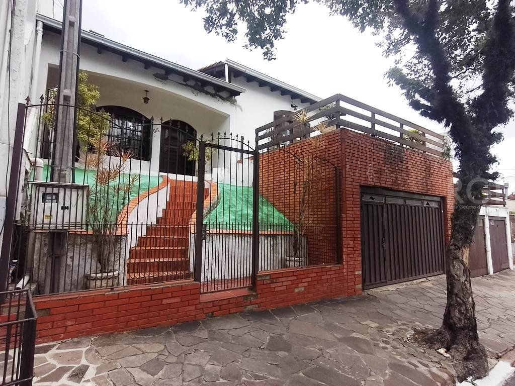 Casa com 172m², 3 dormitórios, 1 suíte, 2 vagas no bairro Partenon em Porto Alegre para Comprar