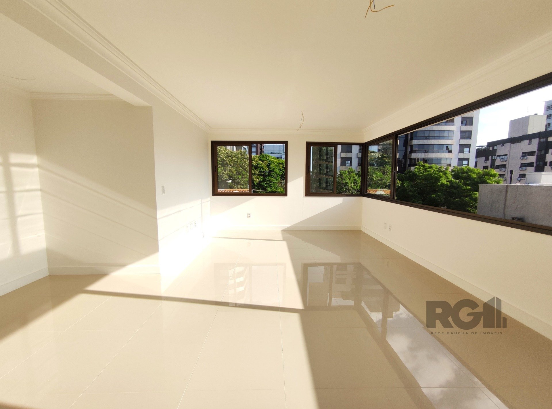 Apartamento com 76m², 2 dormitórios, 1 suíte, 2 vagas no bairro Rio Branco em Porto Alegre para Comprar